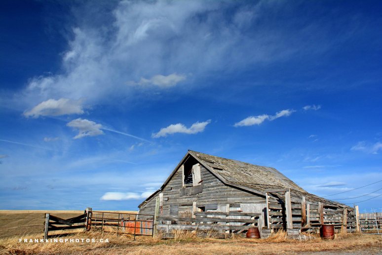 Pincher Creek Alberta old barn blue sky prairies